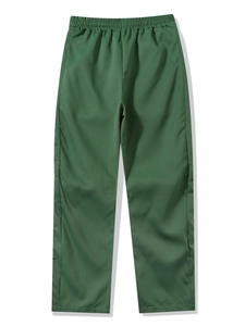 Detail view of dark green cargo pants featuring an elastic waistband and straight leg cut