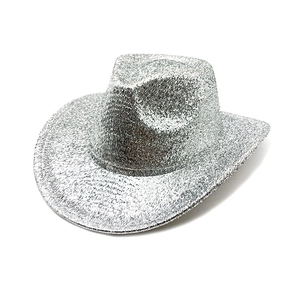 Detailed macro view showing silver glittery texture on western cowboy party hat
