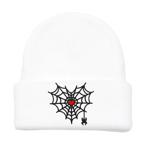 White spider web heart knit beanie hat with red heart and small black spider charm