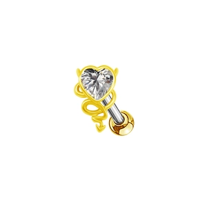 Detail of heart-shaped zircon piercing stud with gold devil tail design and ball back