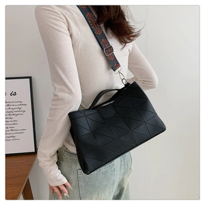 Fashion black bucket bag with geometric texture and colorful ethnic wide strap