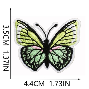 Detailed embroidery of a green butterfly patch with precise 4.4cm width measurement