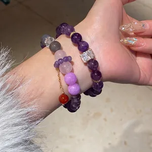 New Chinese style amethyst and agate beaded bracelets with gold accents on wrist