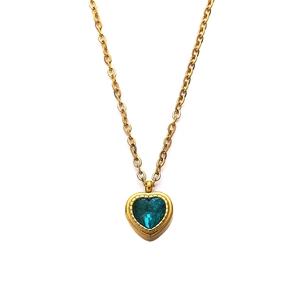 18k gold plated stainless steel necklace with blue zircon heart pendant on white background