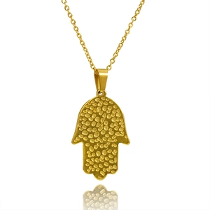 Golden Hamsa Hand necklace with blue evil eye pendant on a minimalist chain