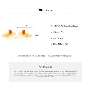 Detail view of orange chiffon flower clip-on earrings showing size 7x6cm and weight 7.1g
