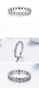 Macro detail showing S925 sterling silver stamp and 0.32cm width on the eternity ring
