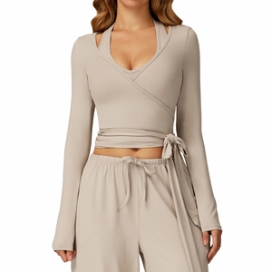 Beige wrap yoga set with cross V-neck long sleeve top and drawstring pants