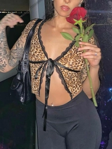 Sexy leopard print crop top with black lace trim and ribbon tie front detail
