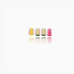 Short Easter press-on nails featuring colorful bunny designs and French tips