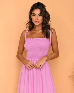 Detail of lavender purple maxi dress showing smocked chest and tie-up shoulder straps
