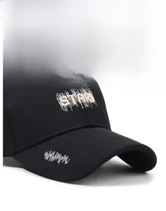 Detailed embroidery of white STARS letters on a structured black canvas baseball cap