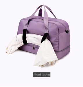 Detail view of purple gym bag showing how to secure a jacket under the straps