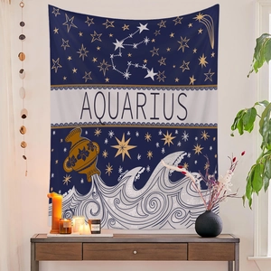 Detail of Aquarius zodiac tapestry hanging on a white wall with home decor accessories