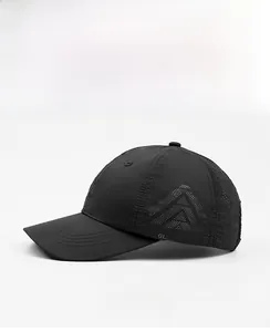 Detailed side view of black quick-dry golf cap with laser-cut vents and GLWR GOLF logo
