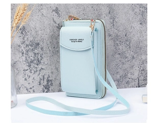 Detail of light blue lychee pattern leather phone bag with Forever Lovely gold lettering