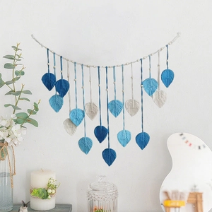 Handmade woven leaf wall hanging in gradient blue cotton yarn for Bohemian home decor