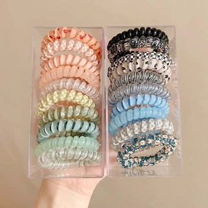 Set di elastici per capelli a spirale con motivi floreali e a scacchi in scatole acriliche
