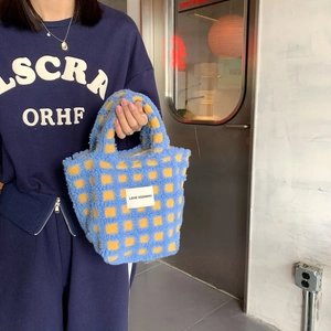 Lambswool checkered waffle tote bag with blue and yellow patterns for women