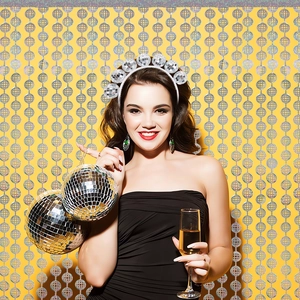 Sparkly silver disco ball headband for parties and festive celebrations shown on model
