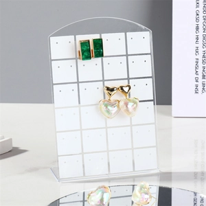 Transparent acrylic 48-hole earring display stand with colorful earrings on a mirror base