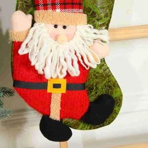 Classic red Christmas stocking featuring 3D Santa Claus doll with plaid hat and white beard