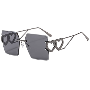 Frameless square sunglasses featuring dual heart-shaped metal accents on the temples