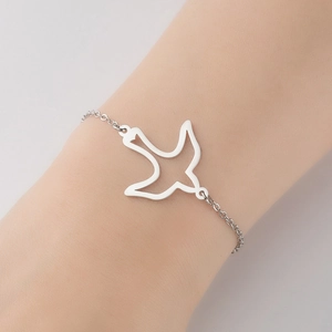 Elegant stainless steel hollow swallow bird charm bracelet in silver finish on wrist