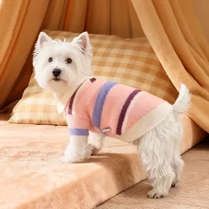 Striped pet knit sweater with polo collar on a white dog in a cozy pet tent