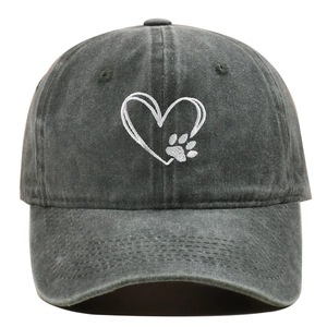 Detailed view of white heart and paw embroidery on vintage washed charcoal baseball cap