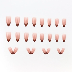 Almond-shaped French leopard blush press-on nails in nude and brown V-shape tips