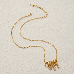 18K gold-plated stainless steel necklace with five interlocking rings and clear crystals