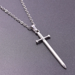 Close-up detail of silver stainless steel fencing sword pendant with classic cross chain