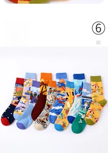 Close-up of assorted patterned crew socks featuring vibrant sports and sunset illustrations