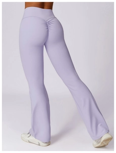 Rear view of lavender flare yoga pants showing high waist and scrunch butt lifting detail