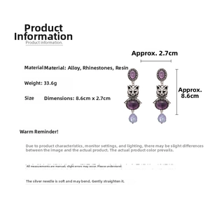Detailed view of vintage cat earrings with purple resin and dimensions 8.6cm x 2.7cm