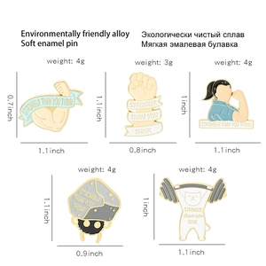 Detail view of 5 fitness enamel pins with size and weight specs on white background