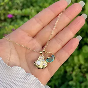18K gold plated necklace with ocean-themed shell and dolphin pendants with zircon stones