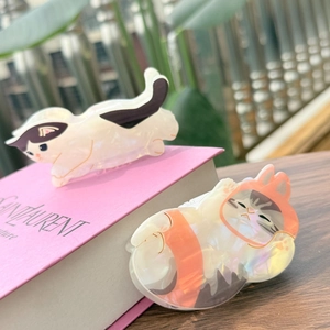 Chic acetate hair claws featuring adorable cat designs in pearlized colorful finish