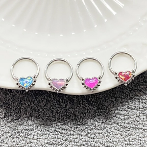 Set of four heart-shaped hinged nose rings with colorful opal stones in silver setting