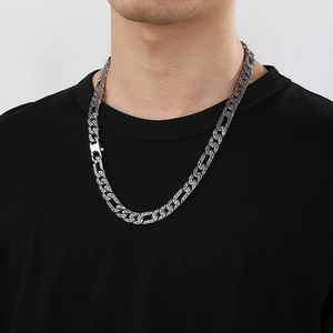 Men's vintage stainless steel flat Cuban link necklace with black pattern on a model