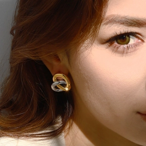 Modern 18k gold stainless steel intertwined heart stud earrings in gold and silver finish