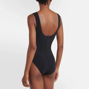 Minimalist black one-piece swimsuit featuring a deep U-back design and wide shoulder straps