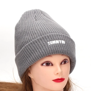 Casual grey ribbed knit beanie featuring white 3D letter embroidery and a folded cuff