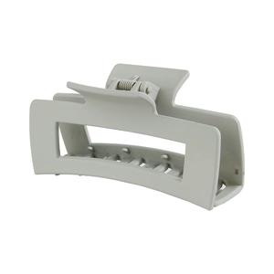 Close-up of a matte grey rectangular claw clip featuring hollow design and metal spring