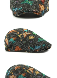 Detailed embroidery of colorful butterfly patterns on vintage jacquard newsboy cap fabric