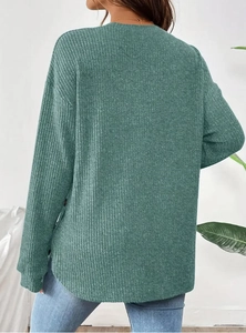 Green long sleeve maternity knit sweater with rib texture and side split hem detail