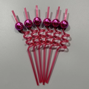 Set of 6 hot pink spiral straws with disco mirror ball decorations for party events