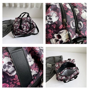 Macro shot of durable oxford fabric and zippers on skull rose gothic travel duffel bag