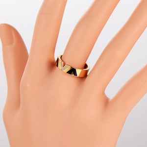 Classic V-shaped gold ring with black enamel inlay and sparkling diamond accents